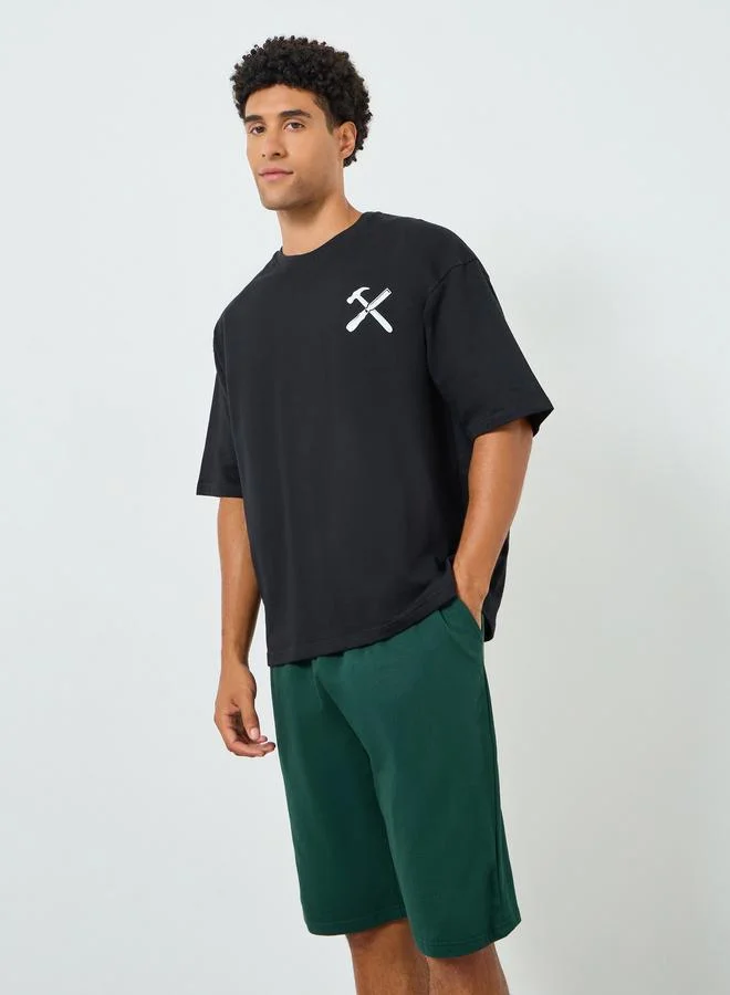 Styli Men Graphic Oversized T-Shirt and Shorts Co-Ords